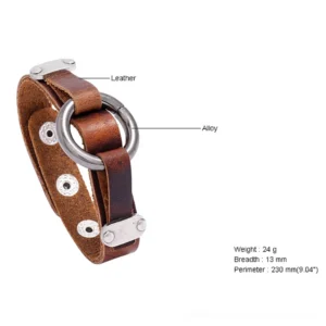 Side view of vintage leather gothic cuff bracelet displaying adjustable snap components and antique silver metal O-ring center detail