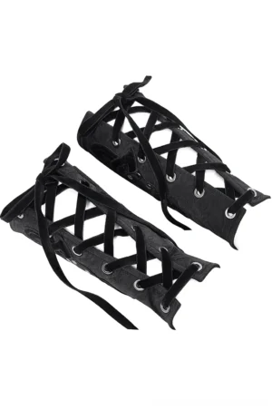 Pair of black gothic arm bracers with adjustable lace-up straps and metal studs, flat lay top-down view