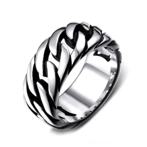 Polished silver stainless steel braided chain gothic ring with woven wheat pattern, front oblique view on white studio background