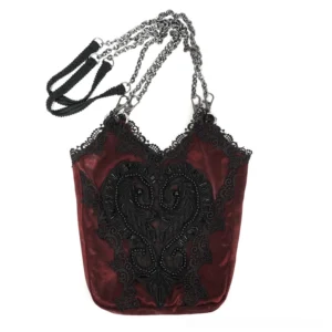 Wine red gothic bucket bag with black beaded heart lace applique and scalloped lace trim, front flat lay