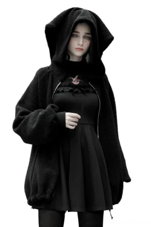 Black gothic bunny ear hooded fleece jacket front three-quarter view with attached plush mystical crossbody purse, featuring crown-shaped zipper pull and hem drawstrings on white background