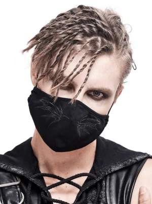 Black gothic face mask featuring silver butterfly wing embroidery worn by male model with braided hair in front three-quarter angle, showcasing embroidered details
