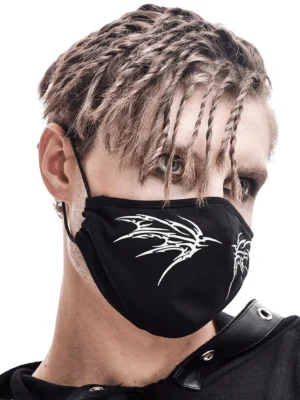 Front view of black gothic butterfly face mask with symmetric white wing prints, worn with studded dark collar accessory