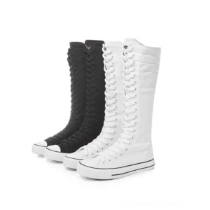 Dual color canvas high-top gothic boots front three-quarter view - black and white options for women