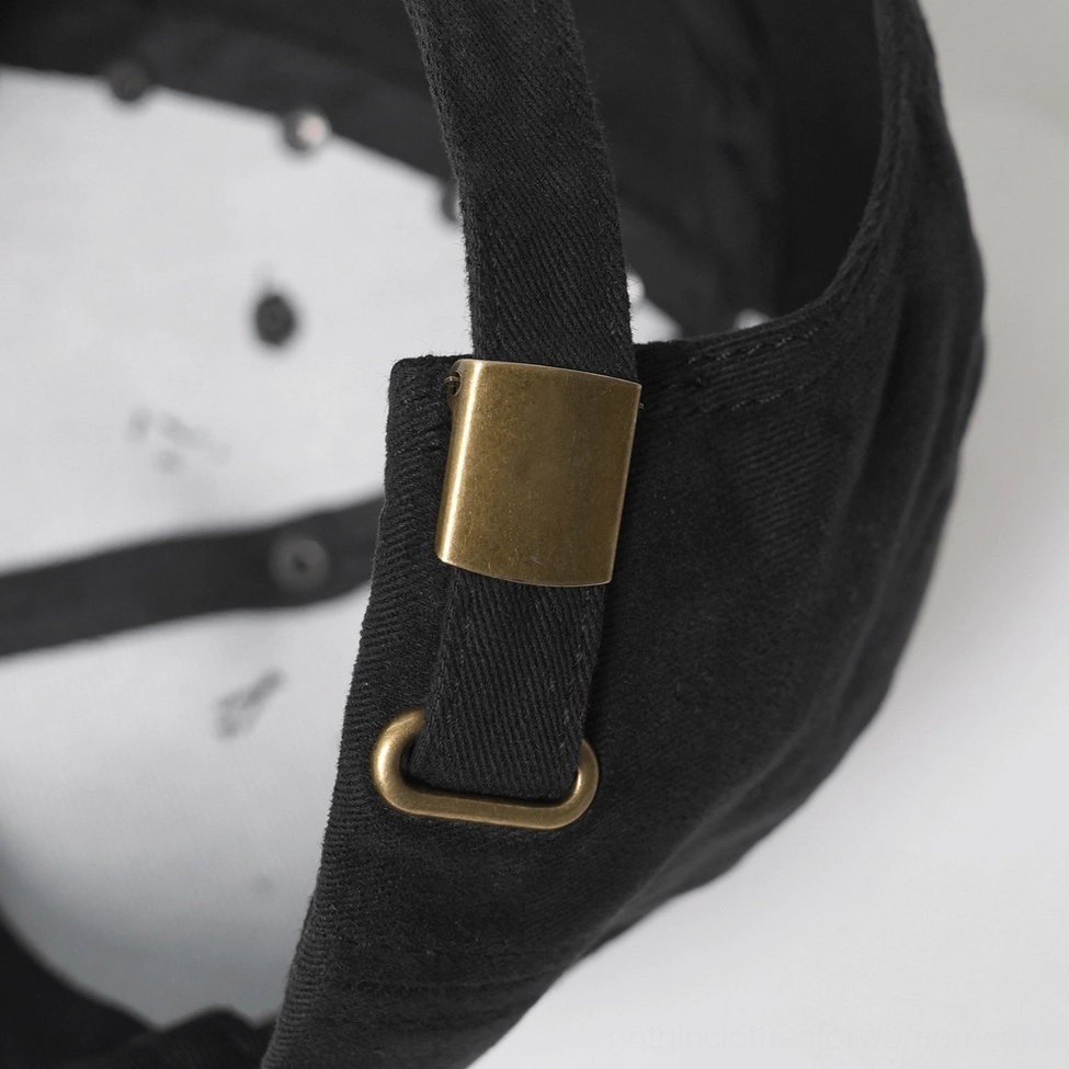 Gothic baseball cap showing adjustable back strap and metal spike embellishment from rear angle