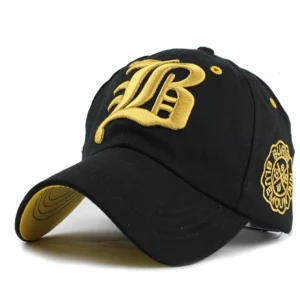 Black gothic hat with gold embroidered lettering, three-quarter perspective showcasing romantic gothic aesthetic