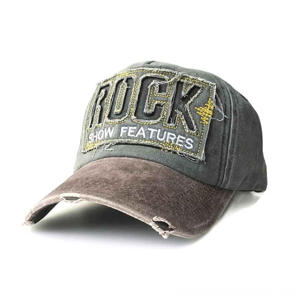 Dark gothic baseball cap in brown and green two-tone coloring, weathered cotton fabric with frayed brim, ROCK SHOW FEATURES patch detail