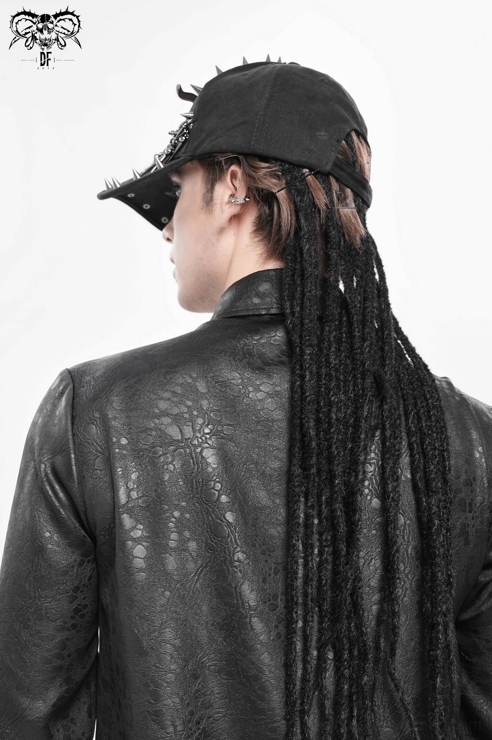 Gothic metal spike baseball cap with chain ornaments displayed showcasing punk-goth aesthetic styling