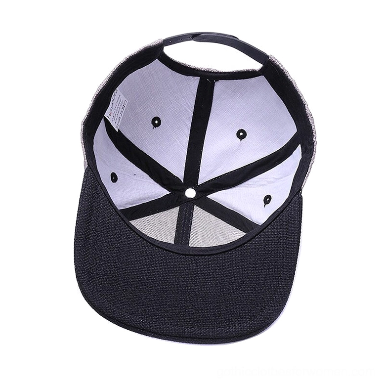 Interior structure of gothic snapback cap showing adjustment strap and six-panel construction