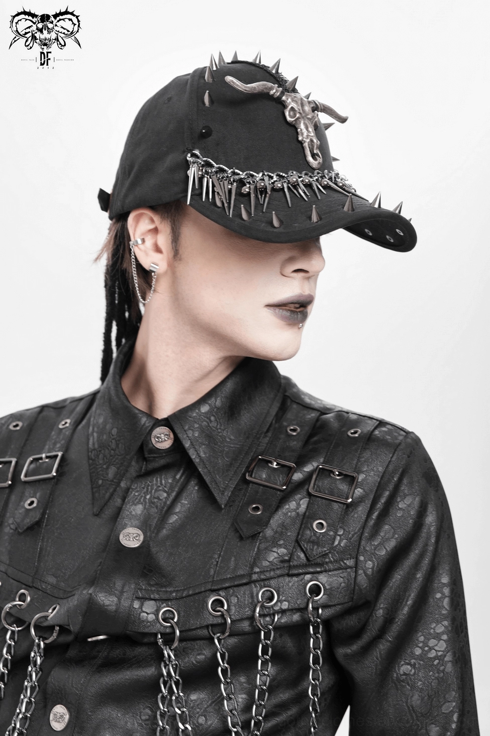 Black gothic baseball cap showing spike embellishment and bull skull motif from frontal perspective