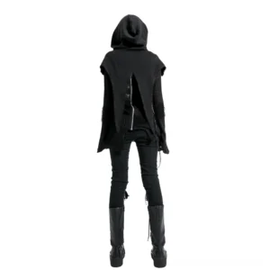 Punk style hooded black knit cape back view on female model with split back zipper decoration, paired with black pants and boots