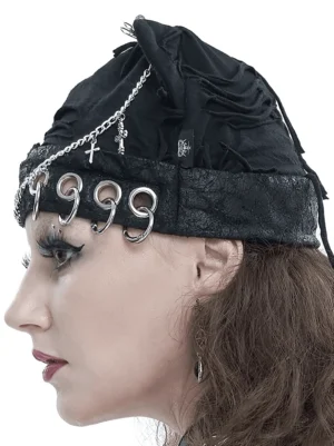 Black distressed gothic cat ear hat with punk metal accessories, left side profile on model