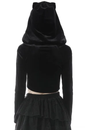 Back view of black velvet gothic hoodie displaying fitted silhouette, cat-ear hood construction, and batwing sleeve details from rear angle