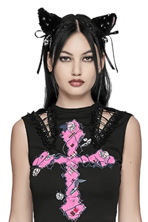 Model wearing black plush cat ear headband with pink lining and satin bow, frontal close-up portrait shot