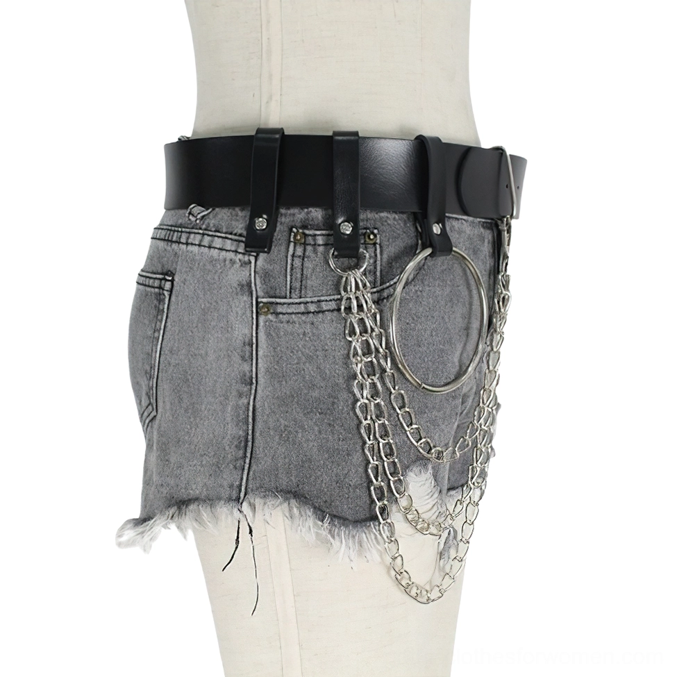 Right back hip view of gothic chain belt with silver metal chains and ring decoration worn on dress form with denim shorts