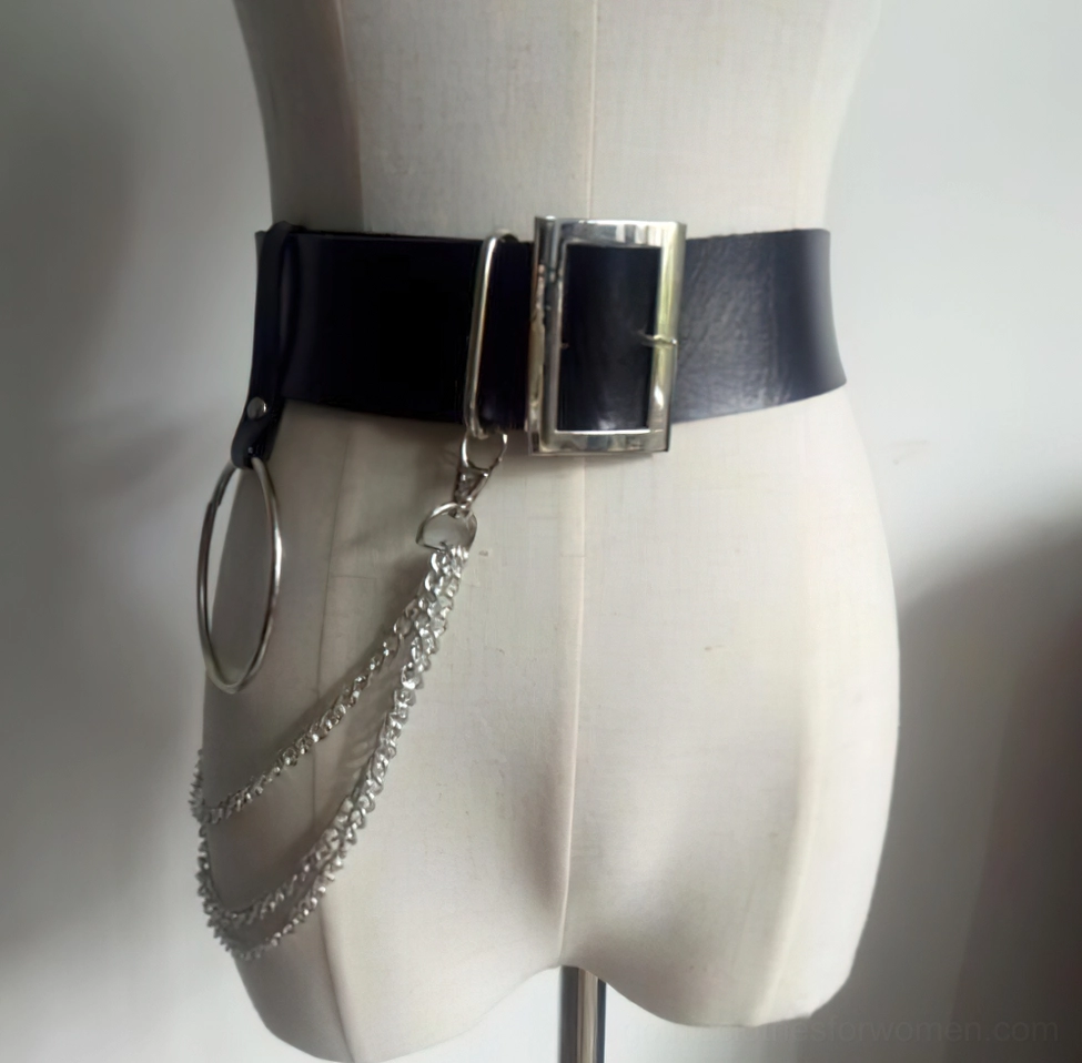 Right side profile view of black faux leather gothic chain belt with double silver chains and large metal buckle ring on dress form