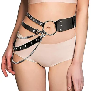 Gothic leather chain harness belt worn on female model, front waist close-up view with silver O-ring and chain accents on plain white background