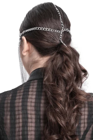 Back view of silver chain gothic headpiece on model showing adjustable chain straps and rear cross details