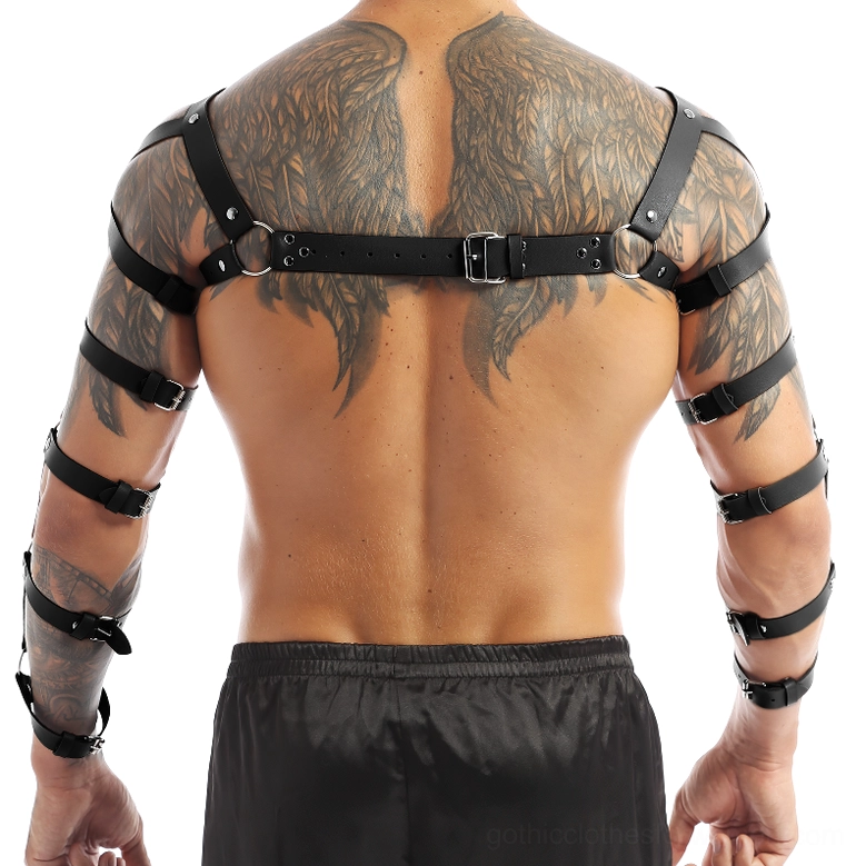 Black faux leather chest harness worn by model from front angle, demonstrating arm extensions and shoulder strap positioning