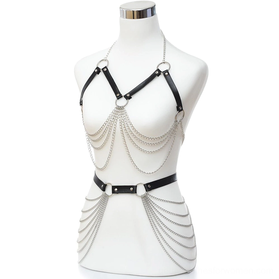 Black leather gothic chest and waist harness with layered silver chain tassels worn on white mannequin front view