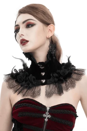 Black gothic velvet choker with rose feather trim and heart-shaped buttons - front three-quarter view on female model