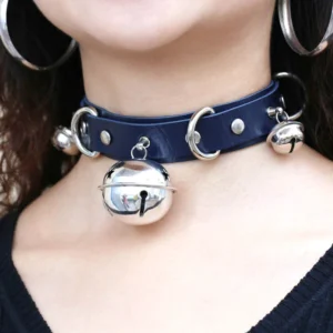 Dark blue PU leather gothic choker necklace worn on model showing silver bells and rivets detail on neck, front close-up view