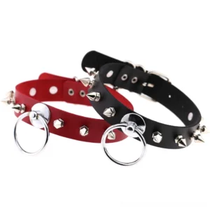 Dual spiked PU leather gothic chokers flat lay with metal O-rings and adjustable buckles on white background