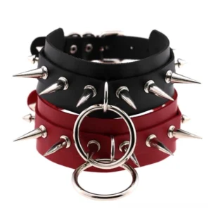 Layered gothic choker set with dual spiked straps and O-rings, black and red combination shown from above