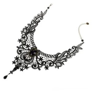 Side profile of gothic lace choker showing central faceted gem, extended metal chain, and teardrop pendant detail