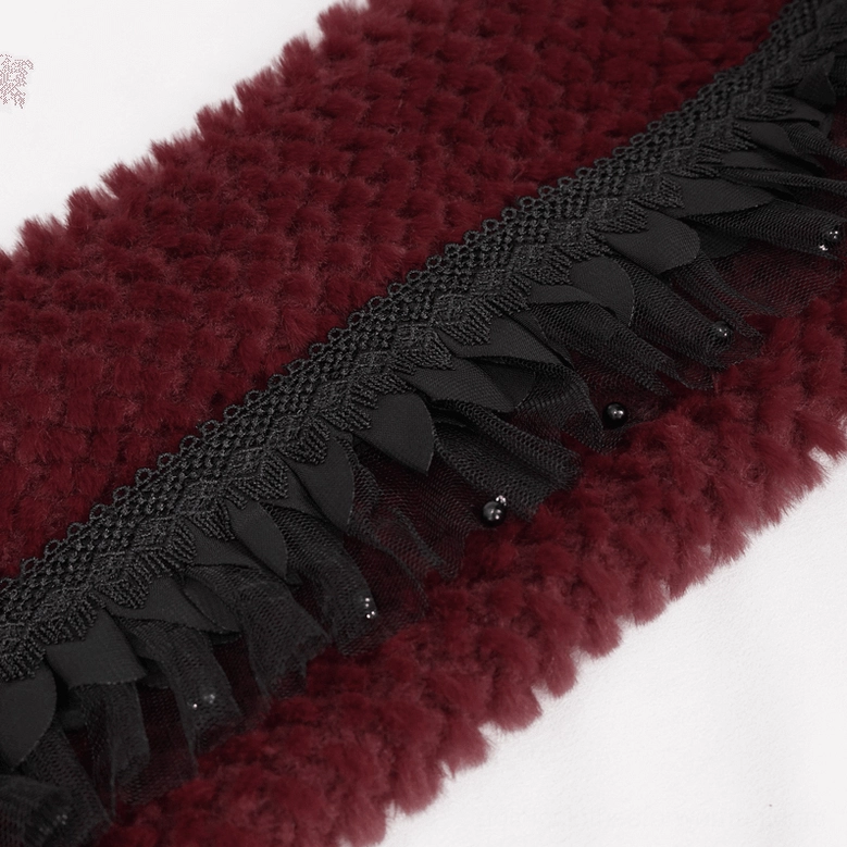Detailed view of woven faux fur collar with black ruffled lace and bead embellishments on gothic choker