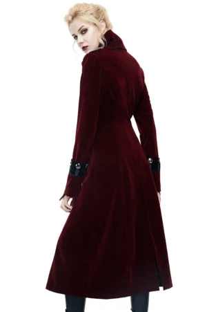Gothic wine red velvet coat - back full-body view displaying fitted waist, black buckle cuffs, and luxurious velvet texture on model