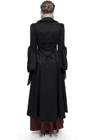 Black beaded gothic coat back view showing lace-up corset closure and jacquard weave fabric