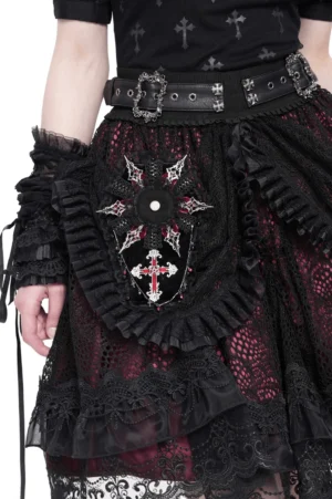 Gothic coffin cross brooch with lace trim worn on black alternative fashion outfit, showing pentagram cross detail and ruffled lace border on female model