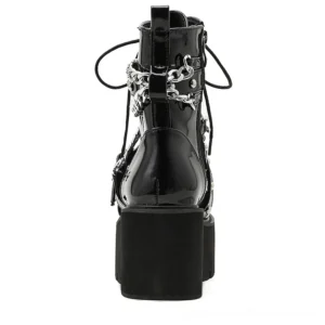Gothic platform ankle boots rear view displaying side zipper closure and metal hardware on chunky block heel