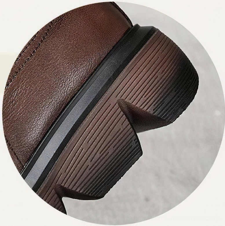 Genuine leather gothic platform combat boots close-up of texture and construction quality