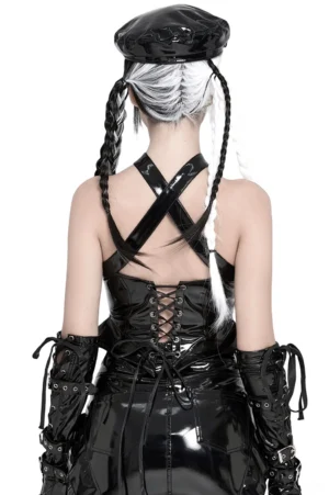 Black gothic patent leather corset with lace-up back panels and crisscross straps, rear view on model