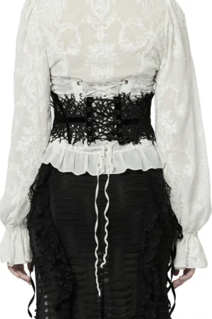Gothic corset belt back view on model displaying adjustable lace-up ribbon ties and sheer branch lace design