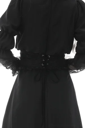 Back view of black lace corset waist belt featuring cross-ribbon lacing and reinforced metal eyelet fasteners, studio photography