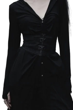 Black gothic corset belt with dual X metal buckles worn by model in front view, showing structured waist definition and mesh panel details