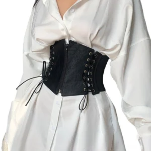 Black lace-up corset belt with zipper worn over white shirt - front upper body view showcasing gothic waist cincher fit