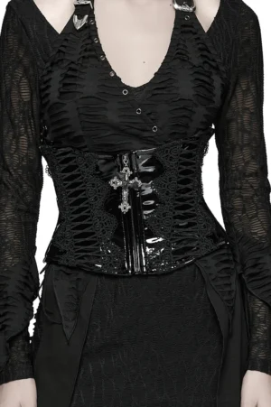 Black patent leather gothic corset belt with lace trim and cross pendant worn on female model, front studio view