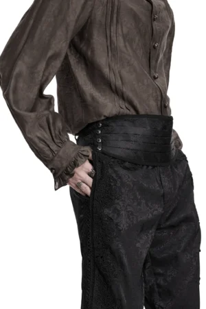 Black jacquard pleated waist belt side wear demonstration showing structured silhouette and pleated detail