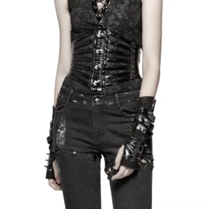 Gothic patent leather corset belt with skull buckle front view on model - glossy black finish with metal spike studs