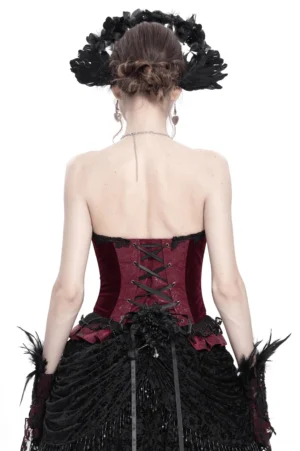 Gothic corset back view featuring ribbon lace-up design, ruffled hem, and model wearing feather gloves with floral accessories