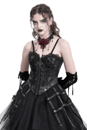 Black gothic lace corset with chains worn over white tulle skirt, front upper body view showcasing lace overlay and cross pendant detail