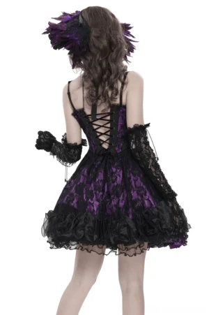 Back view of purple gothic corset dress showing lace-up back closure, ruffled hem, and long lace gloves on model