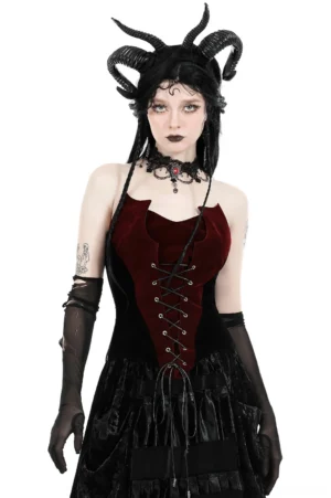 Wine red and black velvet gothic corset with lace-up front, front full-body view on model with demon horn headdress