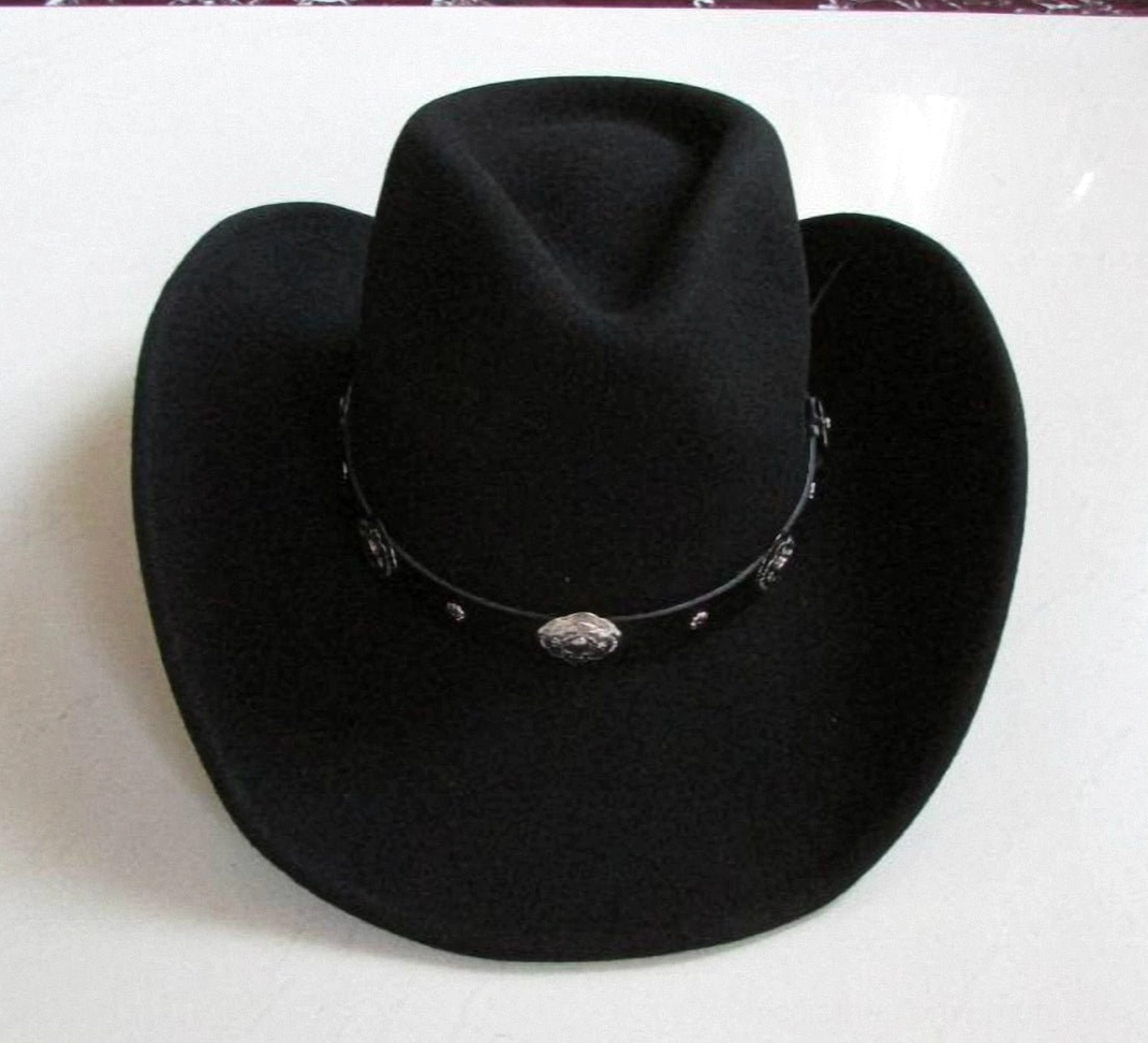 Black wide brim gothic hat with ornate leather strap and metal decorations - tabletop display