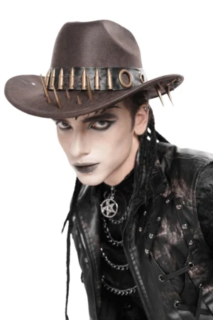 Brown gothic cowboy hat with resin bullets and metal spikes front three-quarter view on male model wearing alternative goth styling