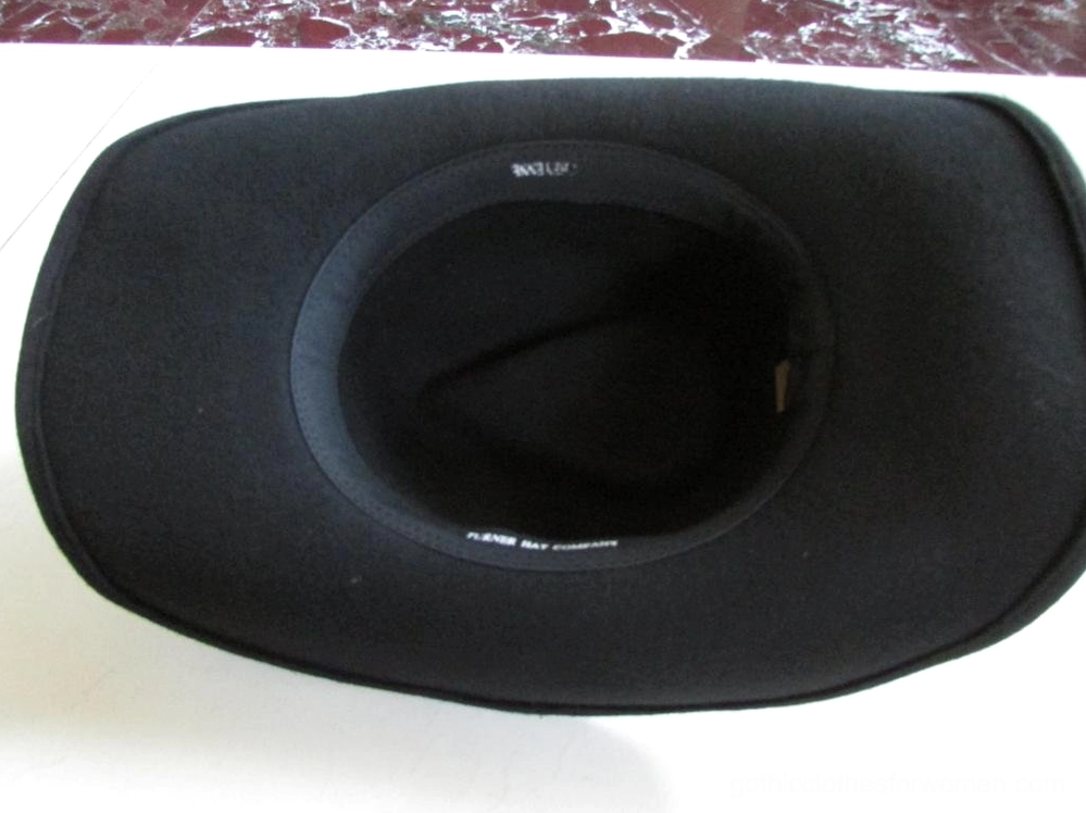 Brown wool wide brim gothic cowboy hat top-down view showing interior size label and flat brim